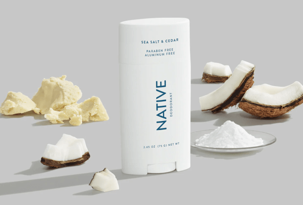 native deodorant photoshoot with pieces of coconut and shea